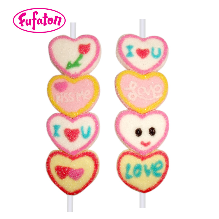 Heart shaped marshmallow candy on a stick