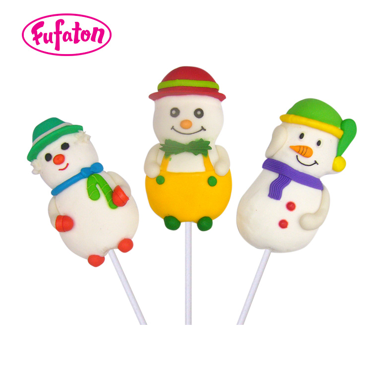 Snowman shaped marshmallow candy lollipops for merry Christmas and Happy New year